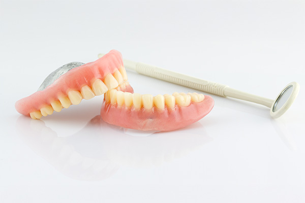 How Denture Adjustments Can Help With Sore Spots