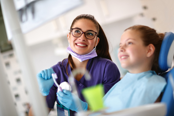 How A Family Dentist Can Keep Your Entire Family Smiling